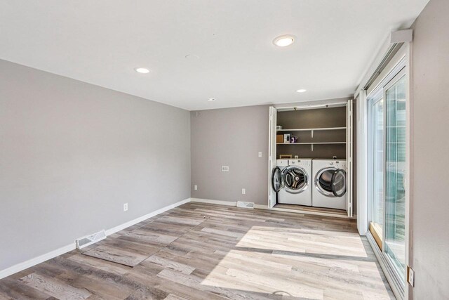 1383 Range Trl, Verona, WI 53593 - laundry room with separate washer and dryer, recessed lighting, and wood finished floors