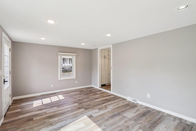 1383 Range Trl, Verona, WI 53593 - empty room with recessed lighting, wood finished floors, and healthy amount of natural light