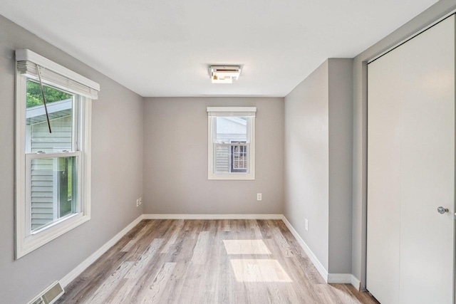 1383 Range Trl, Verona, WI 53593 - spare room with light wood-style floors and baseboards