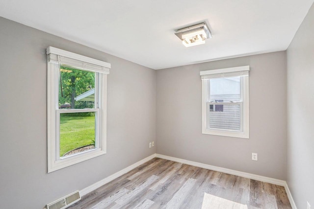 1383 Range Trl, Verona, WI 53593 - spare room featuring light wood-type flooring and baseboards