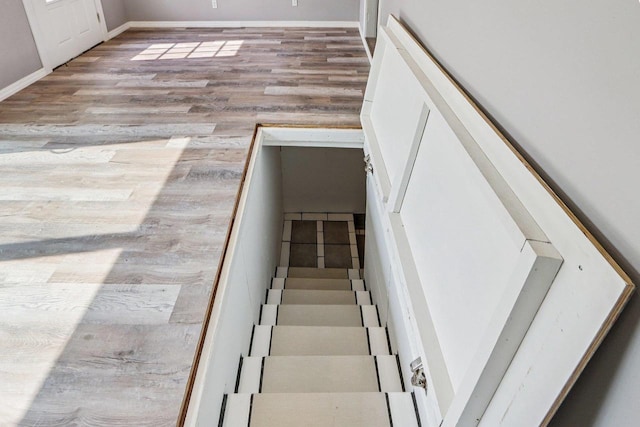 1383 Range Trl, Verona, WI 53593 - stairway featuring wood finished floors and baseboards