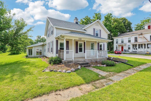 1383 Range Trl, Verona, WI 53593 - view of front of property with covered porch, a chimney, a front lawn, and a shingled roof