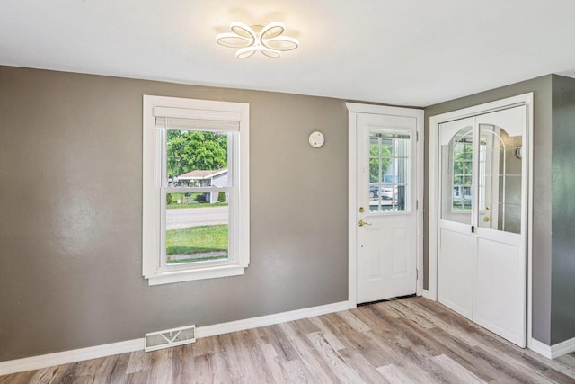 1383 Range Trl, Verona, WI 53593 - foyer entrance featuring light wood-style floors and baseboards