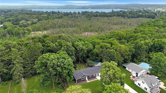 112 S 3rd St, Luck, WI 54853 - drone / aerial view of a heavily wooded area and a large body of water
