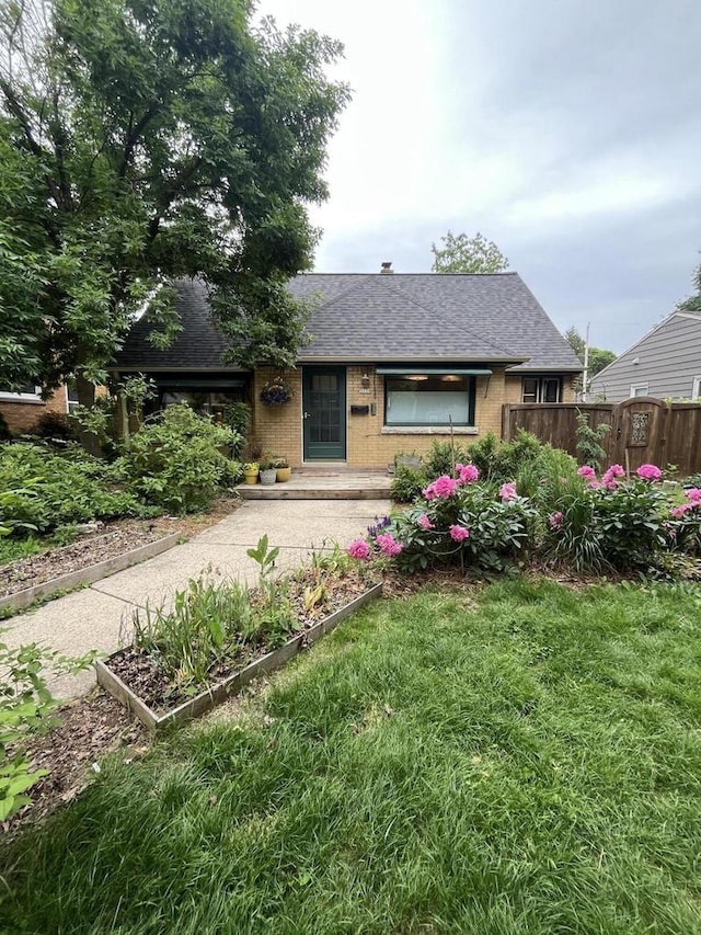 3154 N 82nd St, Milwaukee, WI 53222 - view of front of property with roof with shingles and brick siding