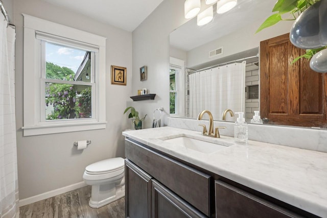 3154 N 82nd St, Milwaukee, WI 53222 - bathroom with wood finished floors, vanity, and a shower with curtain