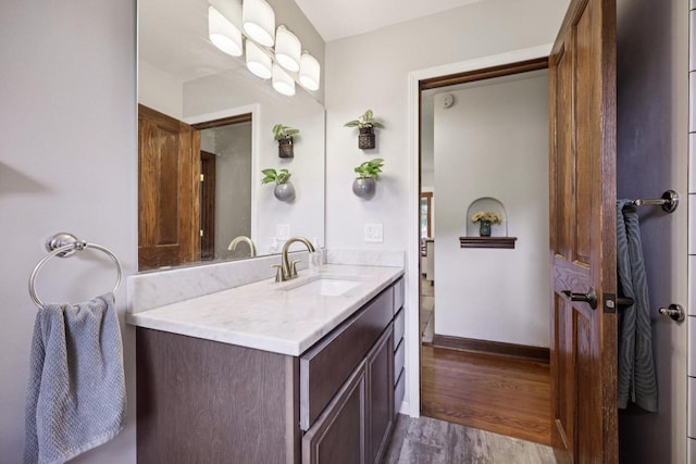3154 N 82nd St, Milwaukee, WI 53222 - bathroom featuring vanity and wood finished floors