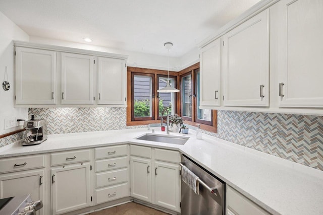 3154 N 82nd St, Milwaukee, WI 53222 - kitchen with dishwasher, tasteful backsplash, light countertops, hanging light fixtures, and white cabinetry