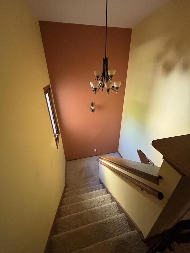 N34W23849 Grace Ave Unit C, Pewaukee, WI 53072 - staircase with a chandelier and carpet flooring