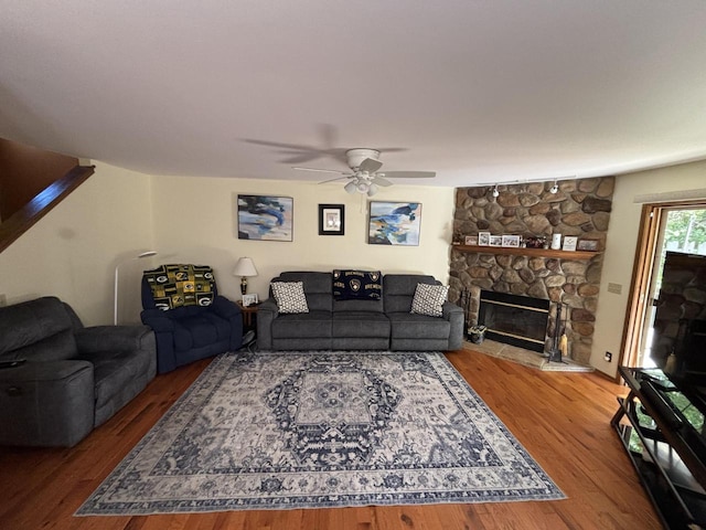 N34W23849 Grace Ave Unit C, Pewaukee, WI 53072 - living area featuring a ceiling fan, wood finished floors, and a fireplace