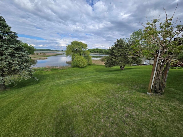 230 Gilbertson St, Markesan, WI 53946 - view of grassy yard with a water view