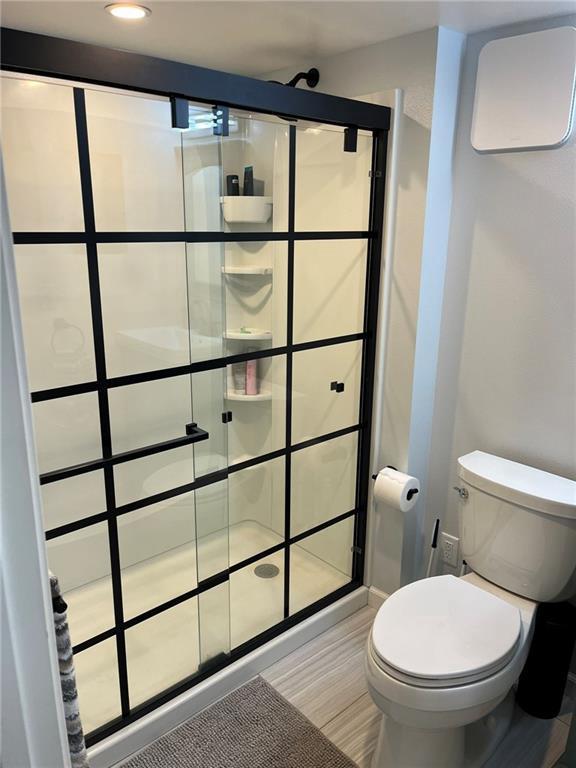 3158 Leslie Ln, Eau Claire, WI 54703 - bathroom with a stall shower and recessed lighting
