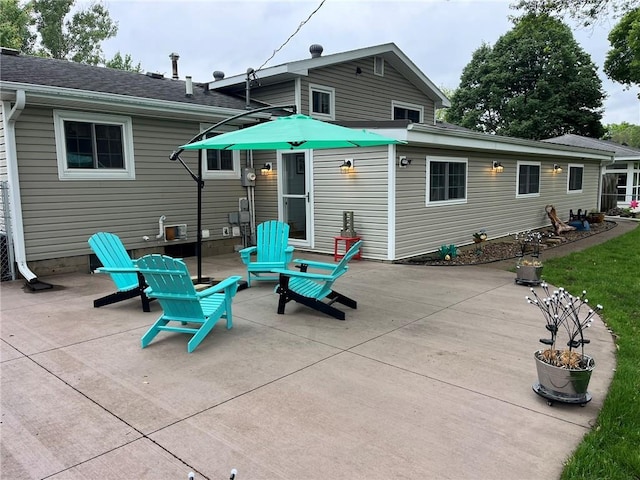 3158 Leslie Ln, Eau Claire, WI 54703 - rear view of house with a patio area