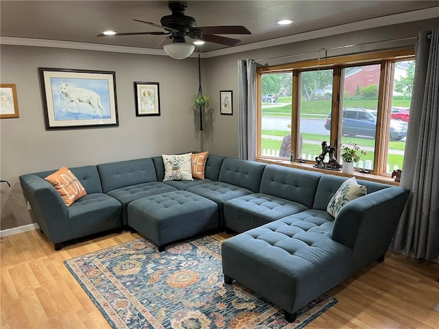 3158 Leslie Ln, Eau Claire, WI 54703 - living area with light wood finished floors, ornamental molding, a ceiling fan, and recessed lighting