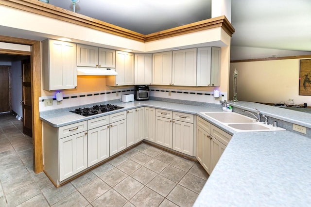 3381 S Highpointe Dr, New Berlin, WI 53151 - kitchen featuring light countertops, black gas stovetop, light tile patterned floors, under cabinet range hood, and lofted ceiling