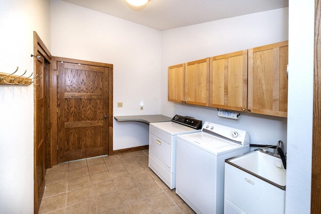 3381 S Highpointe Dr, New Berlin, WI 53151 - laundry area featuring cabinet space, washer and dryer, and light tile patterned floors