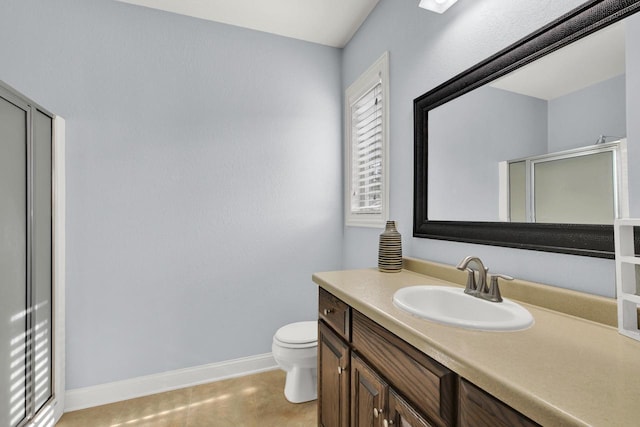 1395 American Eagle Dr, Slinger, WI 53086 - full bathroom featuring vanity, an enclosed shower, and tile patterned floors