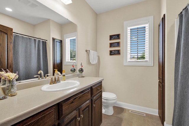 1395 American Eagle Dr, Slinger, WI 53086 - bathroom featuring vanity and a shower with curtain