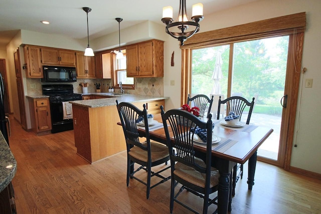 1000 Ridge Rd, Waukesha, WI 53186 - dining area featuring wood finished floors, a chandelier, and recessed lighting