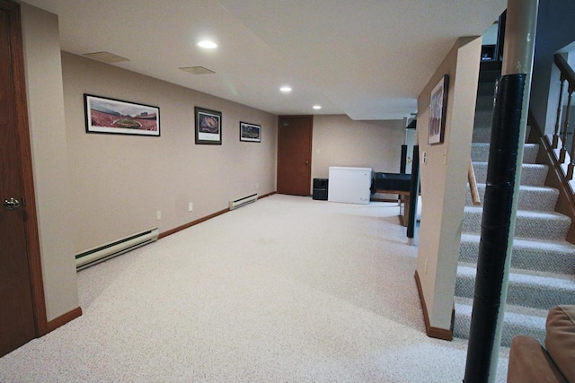 1000 Ridge Rd, Waukesha, WI 53186 - finished below grade area with baseboard heating, carpet flooring, stairway, and recessed lighting