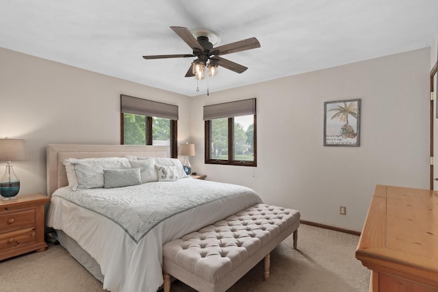 915 Nelson Ave, Milton, WI 53563 - bedroom with light carpet and ceiling fan