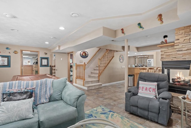 915 Nelson Ave, Milton, WI 53563 - living room with stairway, recessed lighting, and a stone fireplace