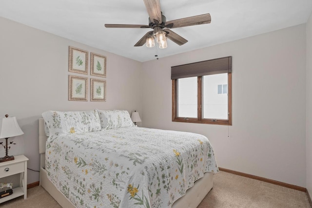 915 Nelson Ave, Milton, WI 53563 - bedroom with carpet floors and ceiling fan