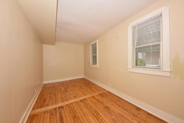 1816 N Arlington Pl Unit 1818, 1818A, Milwaukee, WI 53202 - empty room with wood-type flooring and baseboards