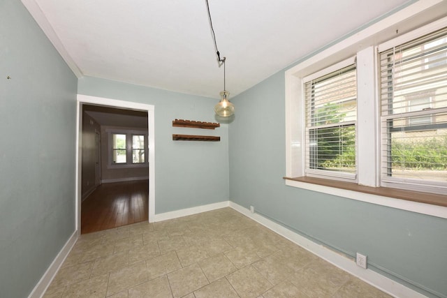 1816 N Arlington Pl Unit 1818, 1818A, Milwaukee, WI 53202 - unfurnished dining area featuring baseboards