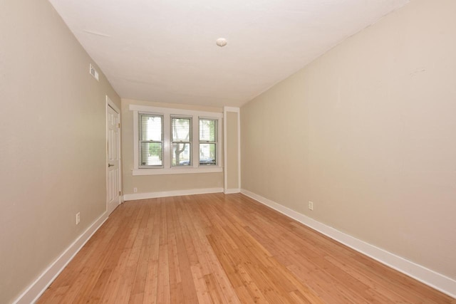 1816 N Arlington Pl Unit 1818, 1818A, Milwaukee, WI 53202 - unfurnished room with baseboards and light wood-style flooring