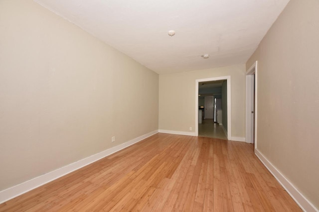 1816 N Arlington Pl Unit 1818, 1818A, Milwaukee, WI 53202 - spare room featuring light wood-style floors and baseboards
