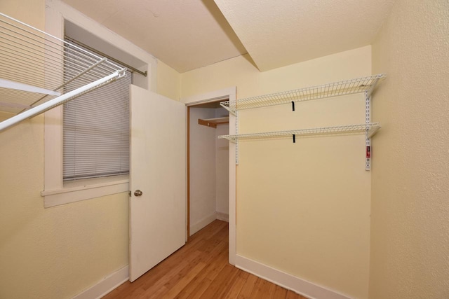1816 N Arlington Pl Unit 1818, 1818A, Milwaukee, WI 53202 - walk in closet featuring light wood-style floors