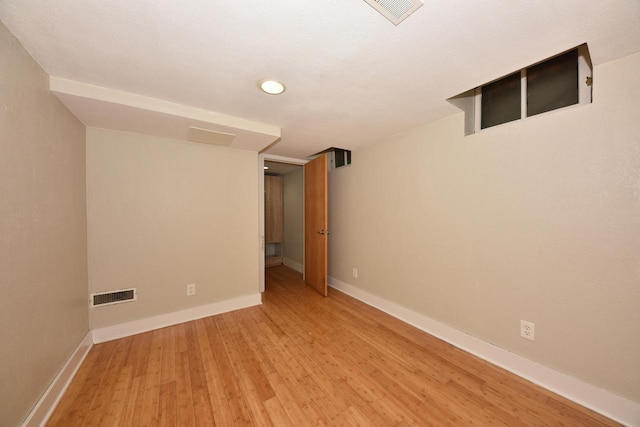 1816 N Arlington Pl Unit 1818, 1818A, Milwaukee, WI 53202 - finished below grade area featuring light wood-style flooring and recessed lighting