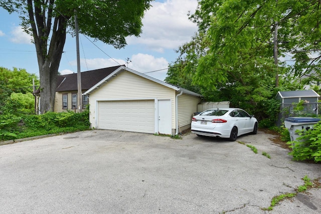 1816 N Arlington Pl Unit 1818, 1818A, Milwaukee, WI 53202 - view of side of home with a detached garage
