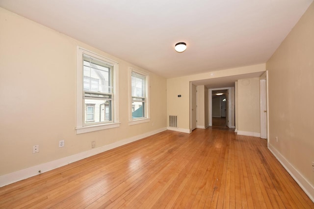 1816 N Arlington Pl Unit 1818, 1818A, Milwaukee, WI 53202 - empty room with light wood-style flooring and baseboards