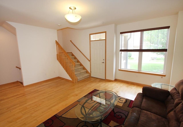 65 S Gardens Way, Fitchburg, WI 53711 - living area with light wood-style flooring and stairway