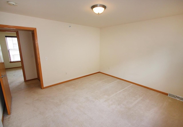 65 S Gardens Way, Fitchburg, WI 53711 - spare room with light colored carpet and a smoke detector