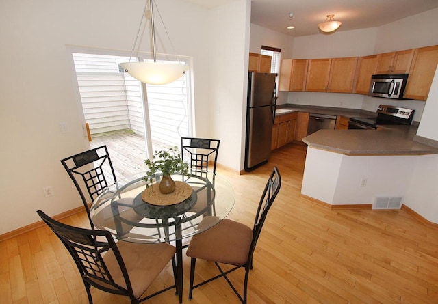 65 S Gardens Way, Fitchburg, WI 53711 - dining room featuring light wood-type flooring and baseboards
