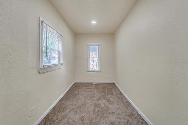 3124 N 29th St, Milwaukee, WI 53216 - carpeted empty room featuring baseboards and a textured wall
