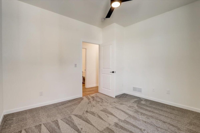 516 Hickory Hollow Rd Unit 0402, Waterford, WI 53185 - carpeted spare room with ceiling fan and baseboards