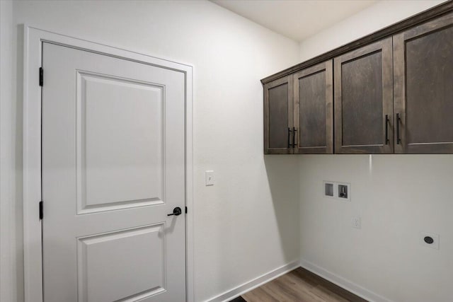 516 Hickory Hollow Rd Unit 0402, Waterford, WI 53185 - washroom featuring cabinet space, wood finished floors, electric dryer hookup, and washer hookup