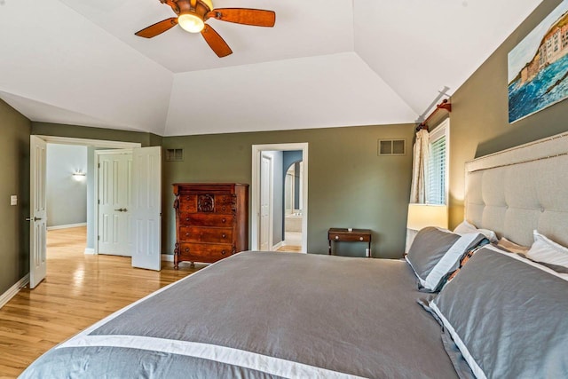 N66W38493 N Woodlake Cir, Oconomowoc, WI 53066 - bedroom featuring light wood-type flooring, lofted ceiling, a ceiling fan, and ensuite bath