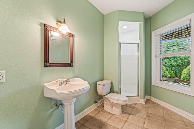 N66W38493 N Woodlake Cir, Oconomowoc, WI 53066 - full bathroom featuring a stall shower and tile patterned flooring