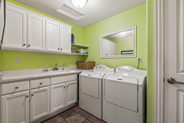 N66W38493 N Woodlake Cir, Oconomowoc, WI 53066 - laundry area featuring washer and dryer and cabinet space