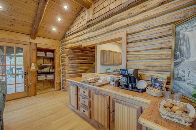 14097 W State Road 77, Hayward, WI 54843 - kitchen with log walls, light wood-style floors, light countertops, recessed lighting, and wood ceiling