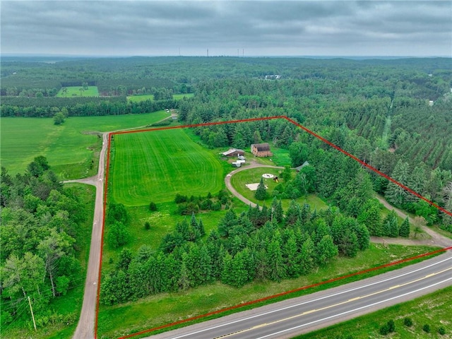 14097 W State Road 77, Hayward, WI 54843 - aerial view of sparsely populated area featuring property boundaries highlighted and a heavily wooded area