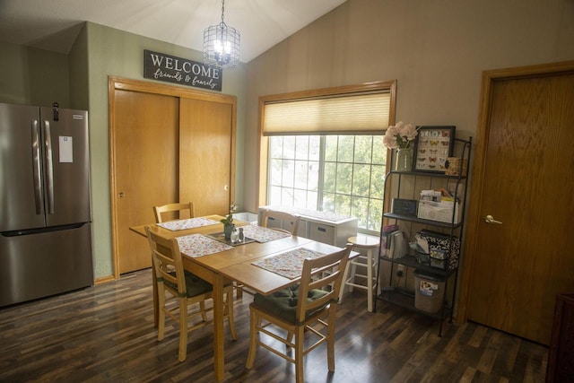 156 Pheasant Run Unit D-4, Johnson Creek, WI 53038 - dining area featuring lofted ceiling, dark wood-style flooring, and a chandelier