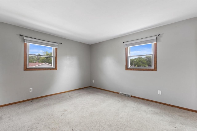 2332 Hughes Ln, Waukesha, WI 53188 - empty room featuring plenty of natural light and carpet