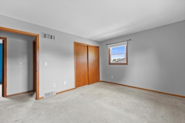 2332 Hughes Ln, Waukesha, WI 53188 - unfurnished bedroom featuring carpet floors and a closet
