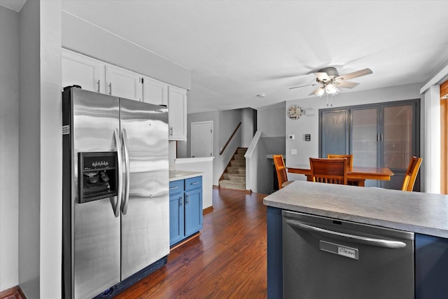 2332 Hughes Ln, Waukesha, WI 53188 - kitchen featuring stainless steel appliances, a ceiling fan, white cabinetry, light countertops, and dark wood-type flooring